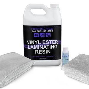 White gallon jug of vinyl ester laminating resin in the middle of folded fiberglass cloth, catalyst and folded chopped strand mat.