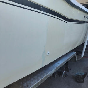 Side of boat showcasing a section that Aqua Blue 100 Fast Cut Compound was used on.